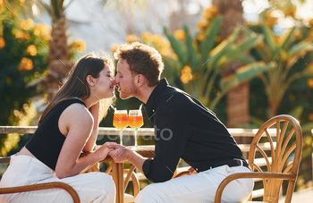 Closeness of the people. Happy young couple is together on their vacation. Outdoors at sunny daytime / Photodune, Misc