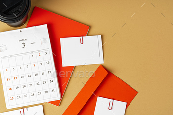 Red and white blank branding paper on beige background / Photodune, Misc