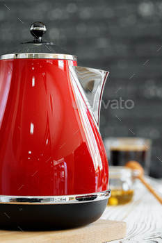 Red kettle on kitchen table close up / Photodune, Misc