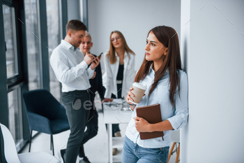 Portrait of cheerful woman with cup of drink / Photodune, Misc