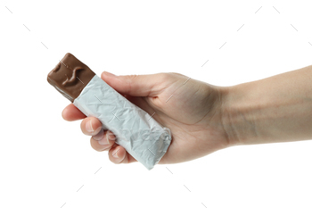 Female hand holds candy bar, isolated on white background / Photodune, Misc