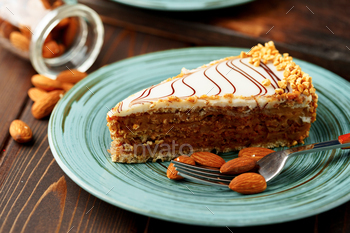 Piece of esterhazi cake on green plate / Photodune, Misc