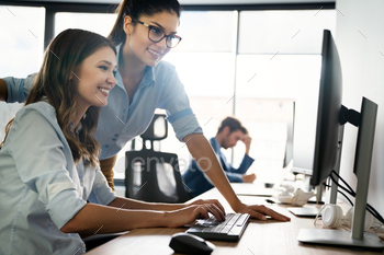 Creative people working in office on computer / Photodune, Misc