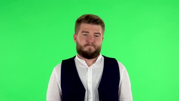 Upset Man Shrugs and Shakes His Head Negatively. Green Screen