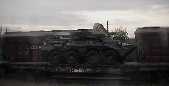Railroad Cars Carrying Military Equipment