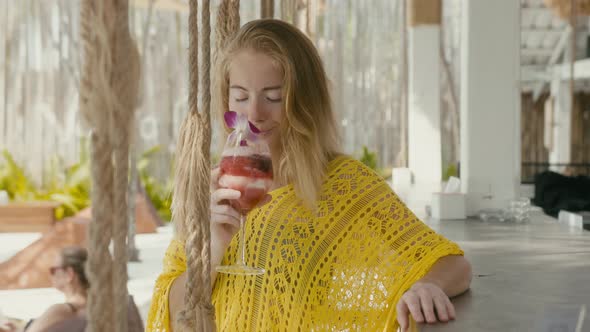 Portrait of Beautiful Woman on Vacation Enjoy Fruitshake