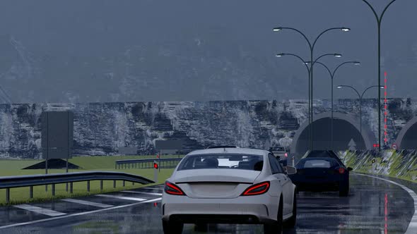 Vehicles Moving Towards the Tunnel in Rainy Weather