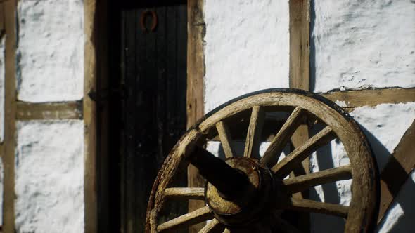 Old Wood Wheel and Black Door at White House alt