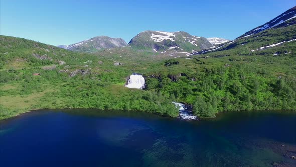 Flight towards waterfall in Norway