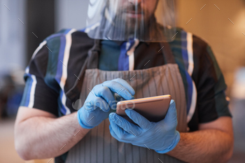 Cafe Waiter Wearing Protective Gear / Photodune, Misc