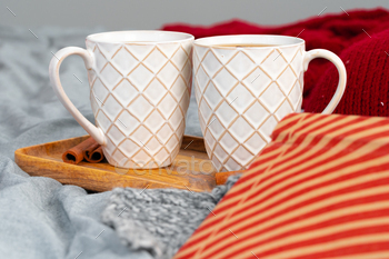 Close up shot of a cups of tea on wooden board at a Christmas interior / Photodune, Misc