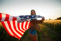 4th of July. American woman with the national American flag - PhotoDune Item for Sale