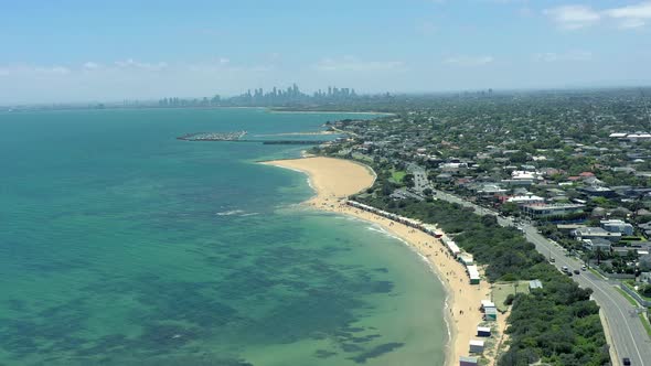 Dendy Street Beach in Melbourne Seen From the Air with the Melbourne Skyline