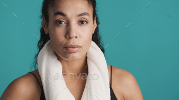 African American woman looking confident on camera after hard wo / Photodune, Misc