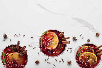 top view of christmas cocktails with orange, pomegranate, cinnamon / Photodune, Misc