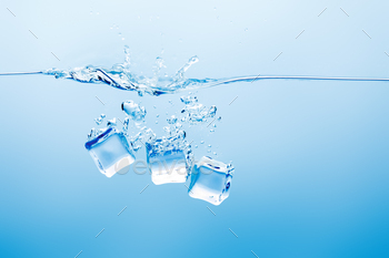 transparent pure water with splash and ice on blue background / Photodune, Misc