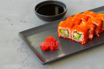 California sushi roll served on black ceramic plate / Photodune, Misc