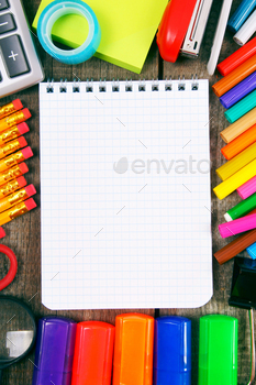 Notebook and school tools around. / Photodune, Misc