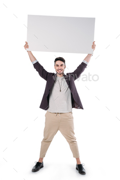 young caucasian man holding blank board isolated on white / Photodune, Misc