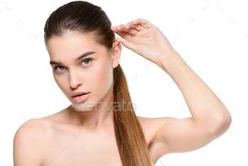 Portrait of young charming woman with beautiful brunette hair posing isolated on white / Photodune, Misc