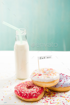 Group of donuts  with milkshake in bottle on the table / Photodune, Misc