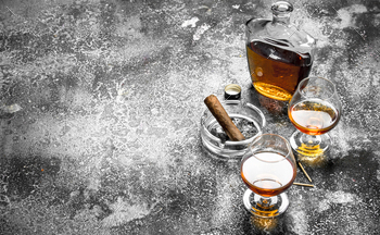 French cognac with a cigar. / Photodune, Misc