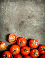 Wet tomatoes on stone table. - PhotoDune Item for Sale