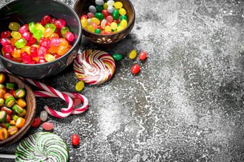 Multicolored candy, jelly and marshmallows in a bowl. / Photodune, Misc