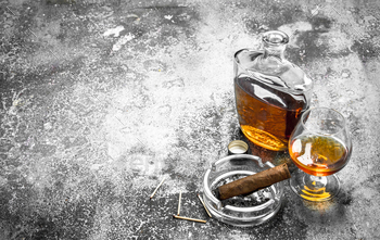 French cognac with a cigar. / Photodune, Misc