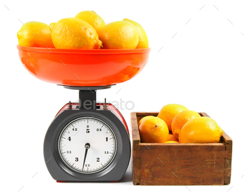 Lemons on scales and in a box / Photodune, Misc