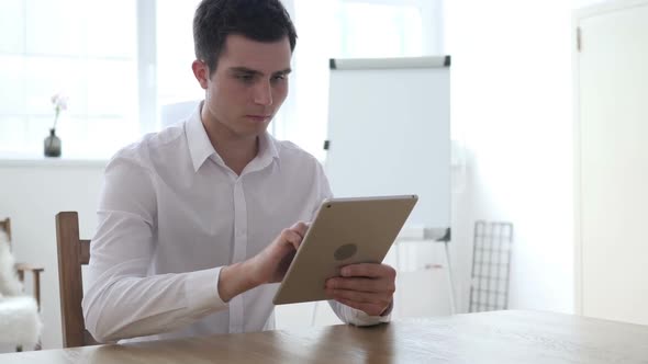 Businessman Using Tablet for Online Market Business