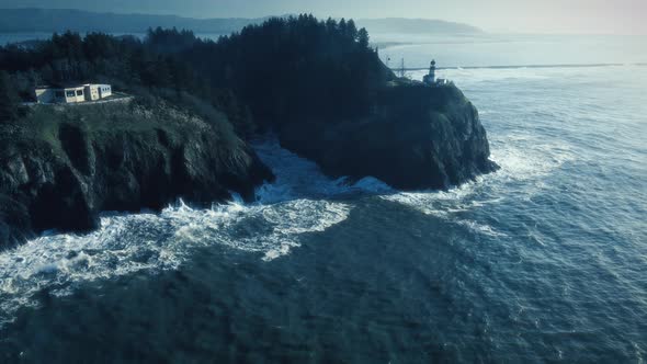 Washington Coast Aerial Background With Lighthouse On Cliff Above Ocean Waves