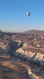 Vertical Video of Hot Air Balloons Flying in the Sky Over Cappadocia Turkey