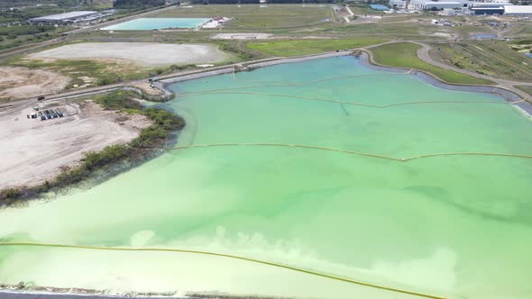 high altitude aerial of Piney Point phosphate pool leak and cleaup.  Area evacuation