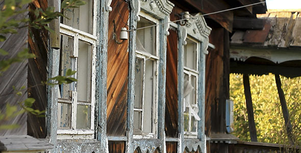 Crashed Windows In Abandoned Village House