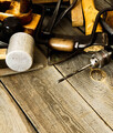 Many old working tools (drill, pliers and others) on a wooden background. - PhotoDune Item for Sale