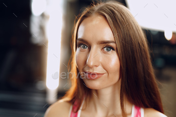 Young beautiful woman in sportswear in a gym / Photodune, Misc