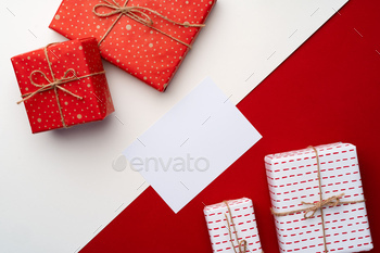 Beautiful red and white composition with Christmas gifts / Photodune, Misc