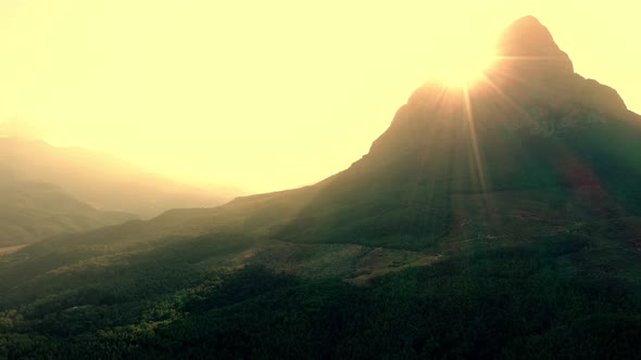 Majestic Sunrise with View to Green Valley and Montain Peak