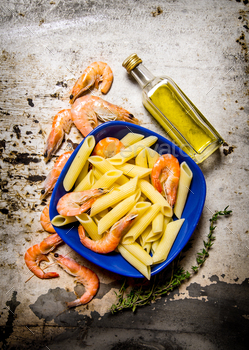 Pasta with shrimp and olive oil. On rustic background. / Photodune, Misc