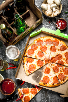 Pizza background. Pepperoni with beer. / Photodune, Misc