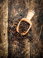 Grains of coffee in a scoop. - PhotoDune Item for Sale