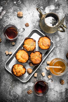 Honey muffins with fragrant tea. / Photodune, Misc