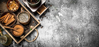 Coffee background. Welded coffee in a Turkish with sugar, cinnamon and coffee beans. / Photodune, Misc