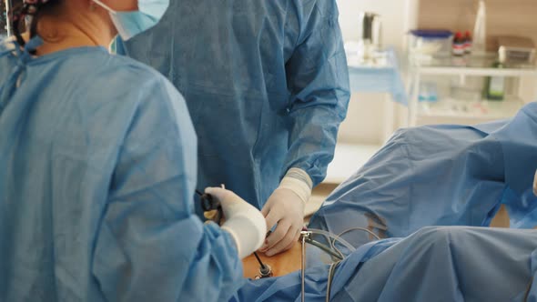 Laparoscopic Instruments in Action During Abdomen Surgery