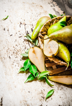 Pears in a basket with leaves . / Photodune, Misc