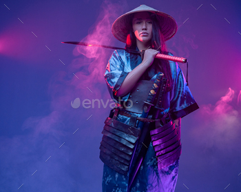 Woman samurai with bamboo hat and steel katana / Photodune, Misc