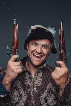 Portrait of crazy pirate with boarding pistols / Photodune, Misc
