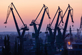 Gdansk, Poland. Silhouettes of port cranes - PhotoDune Item for Sale
