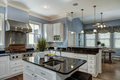 Large American style kitchen and dining room interior with granite countertops - PhotoDune Item for Sale